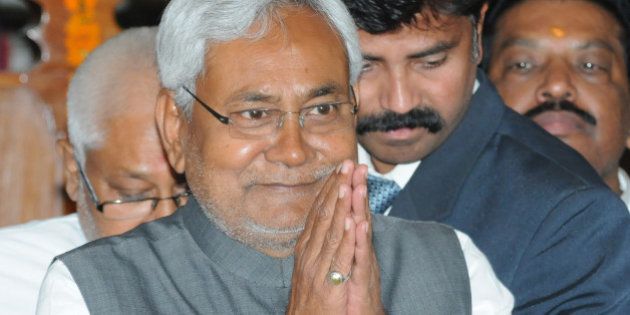 PATNA, INDIA MARCH 11: Bihar Chief Minister Nitish Kumar greets his MLAs before the confidence motion in State Assembly on March 11, 2015 in Patna, India. Bihar Chief Minister Nitish Kumar won the confidence vote with the help of RJD, Congress, CPI and one Independent MLAs in the Assembly. Kumar was sworn-in as Chief Minister of Bihar for the fourth time on February 22 last. (Photo by AP Dube/Hindustan Times via Getty Images)