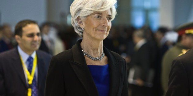 The Managing Director of the International Monetary Fund (IMF) Christine Lagarde (C) arrives for the Egypt Economic Development conference on March 13, 2015, in the Red Sea resort of Sharm el-Sheikh. AFP PHOTO / KHALED DESOUKI (Photo credit should read KHALED DESOUKI/AFP/Getty Images)