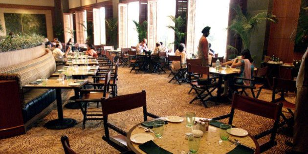 Very few guests are seen eating in the Machan restaurant of Taj Mansingh Hotel in New Delhi, India, in this Oct. 10, 2001 photo. In India, just as in other tourist hotspots in India, Nepal and Bhutan, it's obvious that foreign tourists, spooked by the U.S.-led strikes on Afghanistan, are avoiding the region. (AP Photo/Manish Swarup)