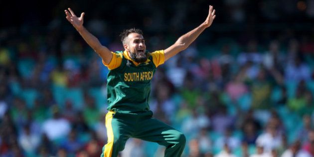 South African bowler Imran Tahir appeals to the umpire for a dismissal during their Cricket World Cup quarterfinal match against Sri Lanka in Sydney, Australia, Wednesday, March 18, 2015. (AP Photo/Rick Rycroft)