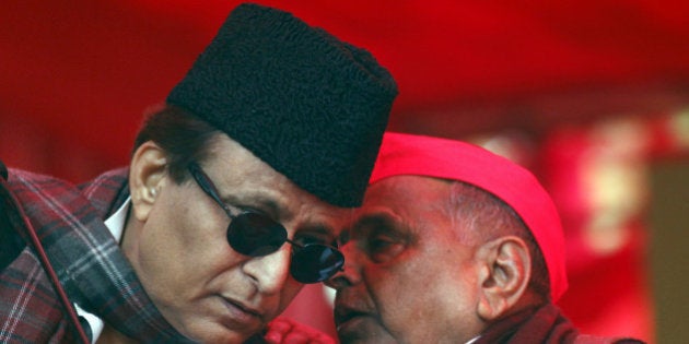 NEW DELHI, INDIA - DECEMBER 22: SP Chief Mulayam Singh talking with SP leader Azam Khan during the protest by Janta Parivar against Modi Government at Jantar Mantar on December 22, 2014 in New Delhi, India. (Photo by Virendra Singh Gosain/Hindustan Times via Getty Images)