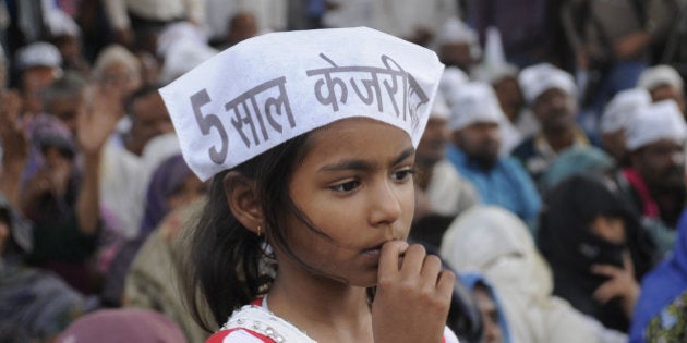 GURGAON, INDIA - FEBRUARY 21: AAP supporters during the launch of 'Jai Kisan Abhiyan' in protest against the recently-introduced 'anti-farmer' land ordinance, and shortage of power and urea in the state, at Kamla Nehru Park, on February 21, 2015 in Gurgaon, India. AAP senior leader Yogendar Yadav said the central government had passed an ordinance nullifying many pro-farmers rules and making the Land Acquisition Act of 2013 'unjustifiable' for farmers. (Photo by Parveen Kumar/Hindustan Times via Getty Images)