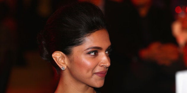 DELHI, INDIA - DECEMBER 07: Deepika Padukone at the Coca-Cola gala dinner during the Coca-Cola International Premier Tennis League third leg at the Indira Gandhi Indoor Stadium December 7, 2014 in Delhi, Delhi. (Photo by Clive Brunskill/Getty Images for IPTL 2014)