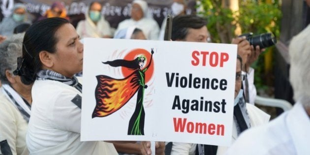 Indian Christians attend a peace protest in Ahmedabad on March 20, 2015, in the wake of the gang-rape on an elderly nun. An Indian state government, West Bengal, was under pressure over the rape of an elderly nun said March 18 it was handing over the case to the country's top investigators after coming under fire over the lack of arrests. AFP PHOTO / Sam PANTHAKY (Photo credit should read SAM PANTHAKY/AFP/Getty Images)