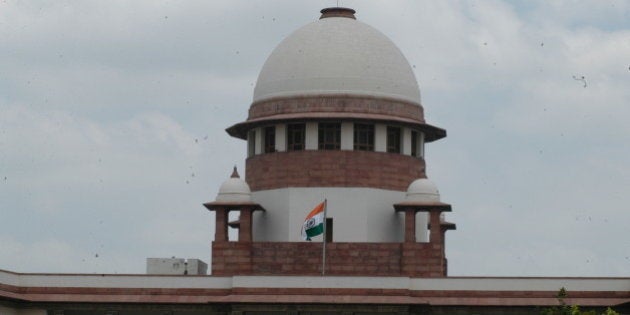 INDIA - AUGUST 08: View of the Supreme Court Building in New Delhi, India (Photo by Yasbant Negi/The India Today Group/Getty Images)