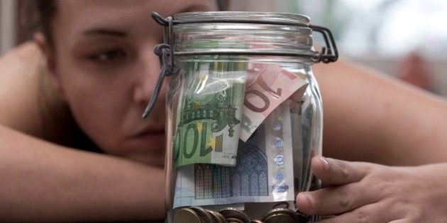 GERMANY, BONN - JANUARY 16:Â You can save on different art. Saved money in a preserving jar, on January 16, 2015 in Bonn, Germany. (Photo by Ulrich Baumgarten via Getty Images)