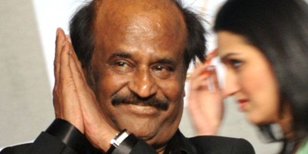Indian actor Rajinikanth arrives to attend the 70th Birthday celebration of Bollywood Actor Amitabh Bachchan in Mumbai late October 10, 2012. AFP PHOTO/STR (Photo credit should read STRDEL/AFP/GettyImages)