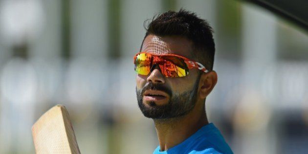 India's Virat Kohli prepares to bat during a final training session ahead of their Pool B 2015 Cricket World Cup match against the United Arab Emirates, in Perth on February 27, 2015. AFP PHOTO / Greg WOOD--IMAGE RESTRICTED TO EDITORIAL USE - STRICTLY NO COMMERCIAL USE-- (Photo credit should read GREG WOOD/AFP/Getty Images)
