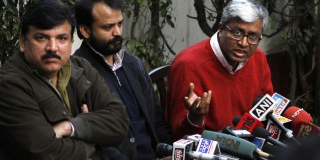 NEW DELHI, INDIA - FEBRUARY 6: AAP leaders Sanjay Singh, Ashish Khetan and Ashutosh addressing the press conference on February 6, 2015 in New Delhi, India. AAP slammed BJP for front page advertisements listing achievements of Central government in most of dailies just a day ahead of elections. Polling will be held tomorrow for 70 seats in the Delhi Assembly elections. Over 1.33 crore electorate will decide the fate of 673 candidates in the fray for the Delhi Assembly elections. (Photo by Virendra Singh Gosain/Hindustan Times via Getty Images)