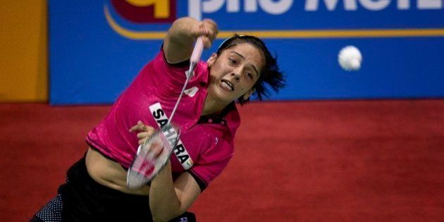 India's Saina Nehwal plays against Thailand's Ratchanok Intanon at the women's singles final of Yonex Sunrise India Open Badminton in New Delhi, India, Sunday, March 29, 2015. (AP Photo/Saurabh Das)