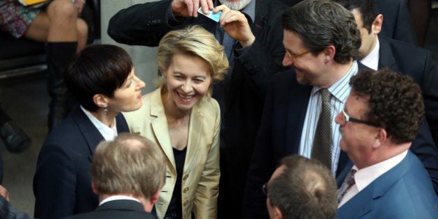 German Labour Minister Ursula von der Leyen . third left, takes part in the vote on quotas for women in management positions in the German Bundestag inÂ Berlin,Â Germany, Thursday April 18, 2013. The German Parliament has rejected an attempt to introduce a quota for women on companies' boards of directors _ defusing for now at least a divisive issue for Chancellor Angela Merkel's government. (AP Photo/ dpa,Wolfgang Kumm)