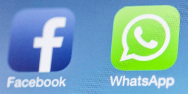 BERLIN, GERMANY - FEBRUARY 25: Facebook next to the WhatsApp logo on iPhone on February 25, 2014 in Berlin, Germany. (Photo by Marie Waldmann/Photothek via Getty Images)