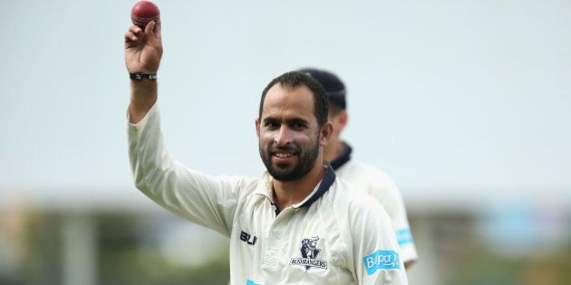 HOBART, AUSTRALIA - MARCH 22: Fawad Ahmed of Victoria walks off holding the ball up high after taking eight wickets during day two of the Sheffield Shield final match between Victoria and Western Australia at Blundstone Arena on March 22, 2015 in Hobart, Australia. (Photo by Robert Prezioso/Getty Images)