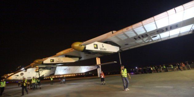 The Solar Impulse 2 with pilot Bertrand Piccard at the controls of the revolutionary plane taxis after landing in Chongqing airport at 1:35 am (17:35 GMT Monday) after a 22-and-a-half hour flight from Myanmar, on March 31, 2015. Solar Impulse 2 landed in China, the world's biggest carbon emitter, as it completed the fifth leg of its landmark circumnavigation of the globe powered solely by the sun. CHINA OUT AFP PHOTO (Photo credit should read STR/AFP/Getty Images)