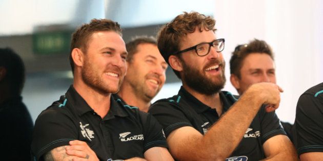 AUCKLAND, NEW ZEALAND - MARCH 31: Black Caps captain Brendon McCullum (L) and Daniel Vettori (R) enjoy the speeches during the Zealand Blackcaps Welcome Home Reception at Queen's Wharf on March 31, 2015 in Auckland, New Zealand. New Zealand had their most successful Cricket World Cup campaign by making the final of the tournament for the first time. (Photo by Fiona Goodall/Getty Images)
