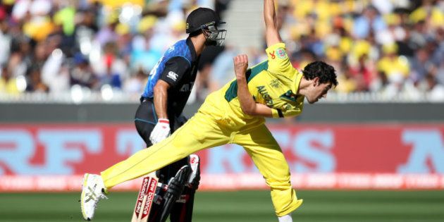 Australia's Mitchell Starc bowls during the Cricket World Cup final against New Zealand in Melbourne, Australia, Sunday, March 29, 2015. (AP Photo/Rick Rycroft)