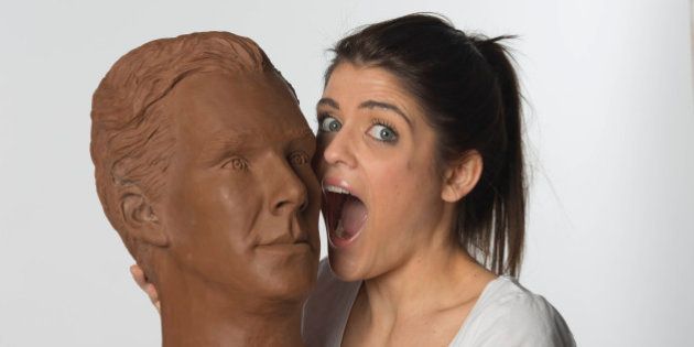 Clodagh Pickavance, 23, interacts with a life-size chocolate sculpture of actor Benedict Cumberbatch. The sculpture has been created to celebrate the launch of television channel Drama on the new on-demand service uktvplay.co.uk following a national poll which named Benedict as Britainâs dishiest television drama actor, just in time for Easter. Picture date: Wednesday 1st April. A crew of eight people worked on the sculpture, which took over 250 man hours to create and weighs 40kg. The statue will be at Westfield Stratford on Friday 3rd April.