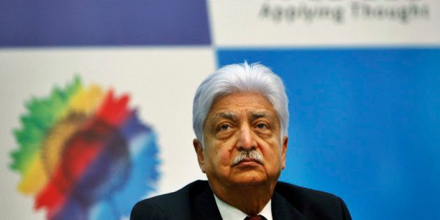 Wipro Ltd. Chairman Azim Premji attends a press conference after announcing the company's quarterly financial results at their headquarters in Bangalore, India, Friday, Jan. 20, 2012. Indian outsourcing company Wipro reported 10 percent growth in December quarter profit, beating expectations thanks to a weak rupee and stable demand. (AP Photo/Aijaz Rahi)