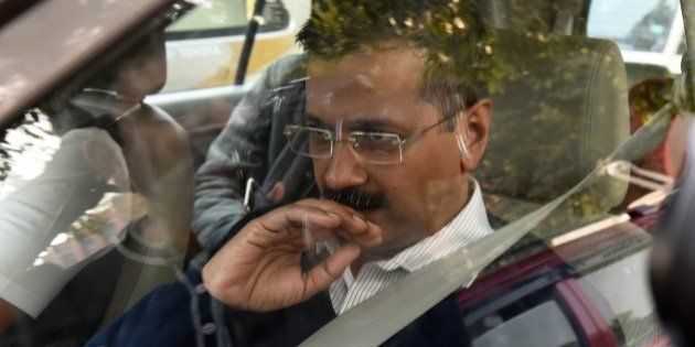 Aam Aadmi Party's Delhi chief minister-designate Arvind Kejriwal arrives for a meeting with Indian Home Minister Rajnath Singh in New Delhi on February 11, 2015, following his win in the Delhi Legislative Assembly election. India's Narendra Modi on February 10 suffered his first major election setback since becoming prime minister last May, as anti-corruption campaigner Arvind Kejriwal won a landslide victory in Delhi state polls. AFP PHOTO / MONEY SHARMA (Photo credit should read MONEY SHARMA/AFP/Getty Images)