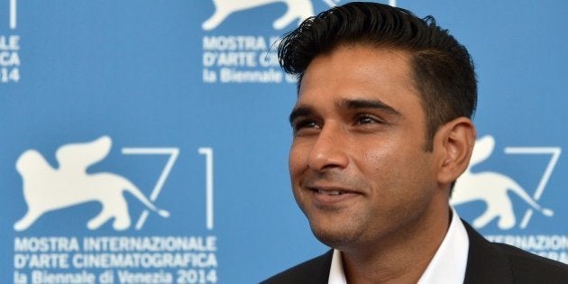 Actor Vivek Gomber poses during the photocall of the movie 'Court' presented in the Orizzonti selection at the 71st Venice Film Festival on September 4, 2014 at Venice Lido. AFP PHOTO / TIZIANA FABI (Photo credit should read TIZIANA FABI/AFP/Getty Images)