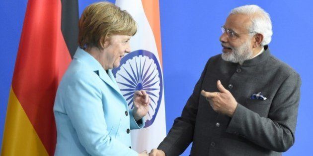 German Chancellor Angela Merkel and Indian Prime Minister Narendra Modi shake hands after a news conference on their talks in Berlin April 14, 2015. AFP PHOTO / TOBIAS SCHWARZ (Photo credit should read TOBIAS SCHWARZ/AFP/Getty Images)