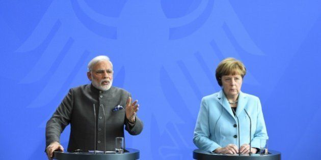 German Chancellor Angela Merkel and Indian Prime Minister Narendra Modi address a press conference on their talks in Berlin April 14, 2015. AFP PHOTO / TOBIAS SCHWARZ (Photo credit should read TOBIAS SCHWARZ/AFP/Getty Images)