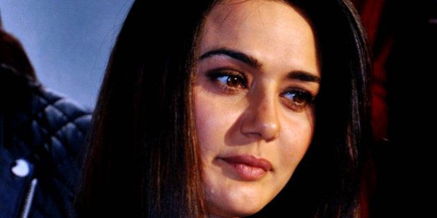 Indian Bollywood film actress Preity Zinta poses during the press meet for the Hindi film 'Ishkq in Paris' directed by Prem Raj in Mumbai on April 30,2013. AFP PHOTO (Photo credit should read STR/AFP/Getty Images)