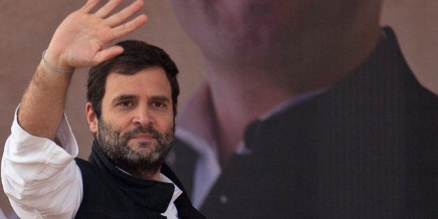 India's opposition Congress party Vice President Rahul Gandhi waves to the crowd during an election campaign rally ahead of Delhi state election in New Delhi, India, Wednesday, Feb. 4, 2015. Delhi goes to the polls on Feb. 7. (AP Photo/Tsering Topgyal)