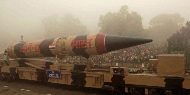 The Indian Agni III missile is displayed during the Republic Day parade in New Delhi, India, Tuesday, Jan. 26, 2010. Paramilitary soldiers and police set up road blocks and snipers took positions atop government buildings as hundreds of thousands of people turned out to celebrate India's national day Tuesday. (AP Photo/Gurinder Osan)