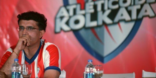 Sourav Ganguly, former Indian cricket captain and co-owner of the Atletico De Kolkata, looks on during the launch of the football team for the Indian Super League (ISL) in Kolkata on September 28, 2014. Ganguly, with three other city based corporate honchos, has Spanish League leaders Atletico Madrid as one of the key partners for the Kolkata franchise of the inaugural edition of the Indian Super League (ISL). AFP PHOTO/Dibyangshu SARKAR (Photo credit should read DIBYANGSHU SARKAR/AFP/Getty Images)