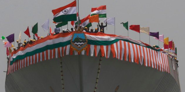 The Indian Navyâs newly built warship INS Visakhapatnam sails into the Arabian Sea during its launch at Mazagon Dock in Mumbai, India, Monday, April 20, 2015. At 7,300 tonnes, Visakhapatnam will be the largest destroyer commissioned by the Indian Navy and will be equipped with the Israeli Multi Function Surveillance Threat Alert Radar (MF-STAR) which will provide targeting information to 32 Barak 8 long-range surface to air missiles onboard the warship. (AP Photo/Rafiq Maqbool)