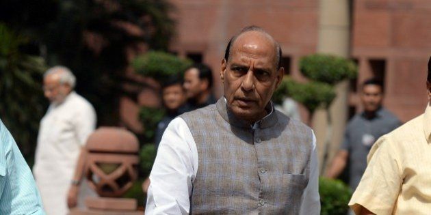 Indian Home Minister Rajnath Singh leaves after a Bharatiya Janata Party (BJP) parliamentary committee meeting at parliament in New Delhi on April 21, 2015. The Land Acquisition Ordinance was tabled amid opposition protest in Lok Sabha on April 20. AFP PHOTO / PRAKASH SINGH (Photo credit should read PRAKASH SINGH/AFP/Getty Images)
