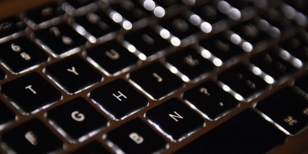 A picture taken on April 17, 2015 in Paris shows the keyboard of a laptop computer. AFP PHOTO / LOIC VENANCE (Photo credit should read LOIC VENANCE/AFP/Getty Images)