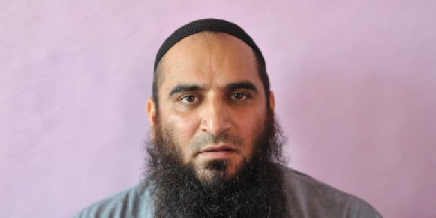 This file photo shows Masarat Alam, a hardline Muslim separatist, in an undisclosed location. On October 18, 2010 Alam, known for his fiery anti-India and pro-freedom speeches, was arrested by police in Srinagar, the summer capital of Indian-administered Kashmir. AFP PHOTO / STR (Photo credit should read STRDEL/AFP/Getty Images)