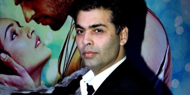 Indian Bollywood director Karan Johar poses during a success party for the Hindi film 'Ek Villain' in Mumbai on July 15, 2014. AFP PHOTO/STR (Photo credit should read STRDEL/AFP/Getty Images)