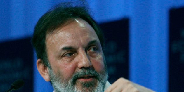 Prannoy Roy, Chairman, New Delhi Television (NDTV), India, gestures while speaking on a panel