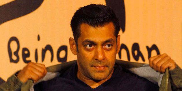 Bollywood star Salman Khan poses wearing a Being Human t-shirt during the launch of Being Human's first flagship store in Mumbai, India, Thursday, Jan. 17, 2013. Being Human is a charitable trust that helps spread education and healthcare for underprivileged children. (AP Photo/Rafiq Maqbool)