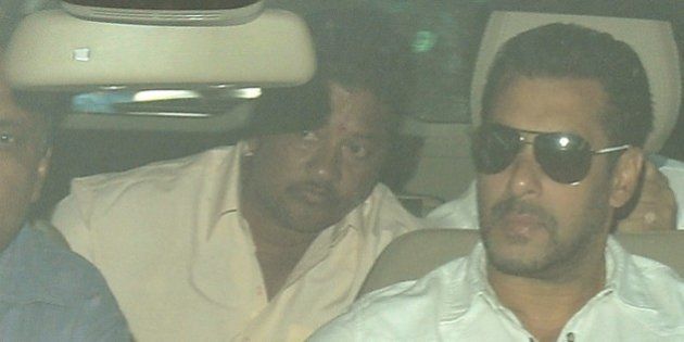 Indian Bollywood film actor Salman Khan (R) arrives in a car to appear at the sessions court in Mumbai on May 6, 2015. An Indian judge convicted Bollywood superstar Salman Khan of killing a homeless man in a 2002 hit-and-run after a night out drinking, rejecting his claim that his driver was to blame. AFP PHOTO/PUNIT PARANJPE (Photo credit should read PUNIT PARANJPE/AFP/Getty Images)