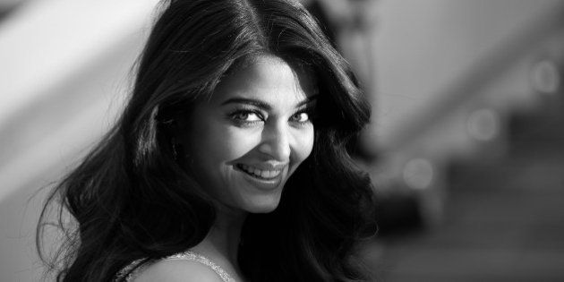 BLACK AND WHITE VERSIONIndian actress Aishwarya Rai Bachchan poses as she arrives for the screening of the film 'The Search' at the 67th edition of the Cannes Film Festival in Cannes, southern France, on May 21, 2014. AFP PHOTO / ALBERTO PIZZOLI (Photo credit should read ALBERTO PIZZOLI/AFP/Getty Images)