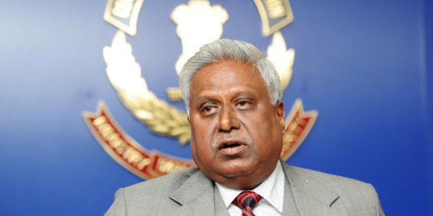India's newly elected Central Bureau of Investigation (CBI) director Ranjit Sinha speaks with the media at CBI headquarters in New Delhi on December 3, 2012. The 59-year-old Sinha, who was the Indo-Tibetan Border Police Director, has served as the CBI's joint director in its anti-corruption unit. The CBI is an Indian governmental agency that jointly serves as a criminal investigation body, national security agency and intelligence agency. AFP PHOTO/ SAJJAD HUSSAIN (Photo credit should read SAJJAD HUSSAIN/AFP/Getty Images)
