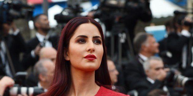 British-Indian actress Katrina Kaif poses as she arrives for the screening of the film 'Mad Max : Fury Road' during the 68th Cannes Film Festival in Cannes, southeastern France, on May 14, 2015. AFP PHOTO / ANNE-CHRISTINE POUJOULAT (Photo credit should read ANNE-CHRISTINE POUJOULAT/AFP/Getty Images)