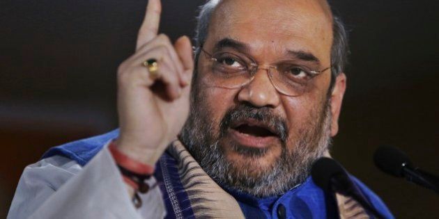Indiaâs ruling Bharatiya Janata Party (BJP) President Amit Shah speaks at a press conference in Hyderabad, India, Thursday, Jan. 8, 2015. Shah is on a two-day visit to the newly created state Telangana. (AP Photo/Mahesh Kumar A.)