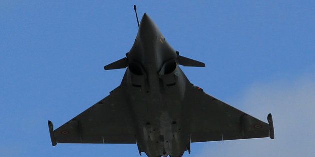 A Rafale jet fighter performs a demonstration flight in Merignac near Bordeaux, southwestern France, Wednesday, March 4, 2015. Egypt will become the first foreign buyer of Rafale fighter jets, purchasing 24 of the multi-role French-made aircraft as part of a 5.2 billion-euro (US$5.93 billion) defense deal that will strengthen Cairo's military might in a tense and violent region. (AP Photo/Bob Edme)