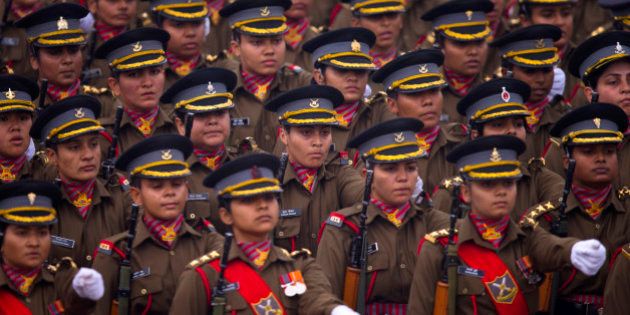 Indian women soldiers march down Rajpath, a ceremonial boulevard that runs from Indian President's palace to war memorial India Gate, during the full dress rehearsal ahead of Republic Day parade in New Delhi, India, Friday, Jan. 23, 2015. U.S President Barack Obama will be the chief guest during this year's parade which will be held on Jan. 26. (AP Photo/Saurabh Das)