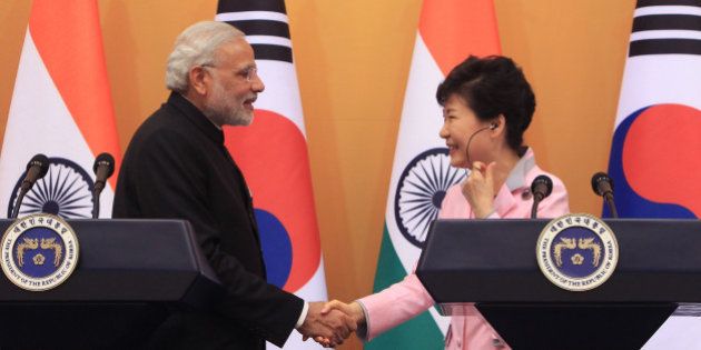 SEOUL, SOUTH KOREA - MAY 18: Indian Prime Minister Narendra Modi (L) and South Korean President Park Geun-Hye hold a joint news conference at the presidential Blue House on May 18, 2015 in Seoul, South Korea. The Indian Prime Minister Narendra Modi is on a two day trip to South Korea to discuss the two countries' strategic partnership. (Photo by Chung Sung-Jun/Getty Images)