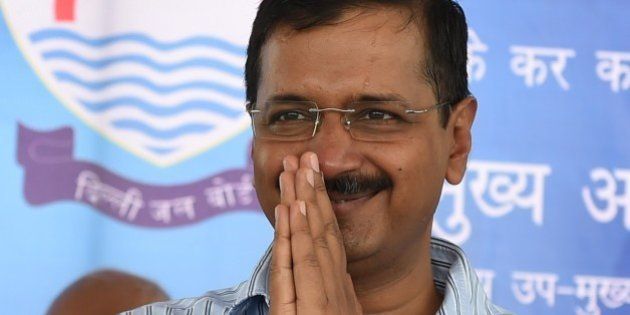 Delhi chief minister, Arvind Kejriwal greets after inaugurating the Bawana water treatment plant (WTP) at Bawana in northern Delhi state on April 21, 2015. With a capacity of 20 million gallons daily (MGD), the plant is expected to boost the capital's water supply. AFP PHOTO / SAJJAD HUSSAIN (Photo credit should read SAJJAD HUSSAIN/AFP/Getty Images)