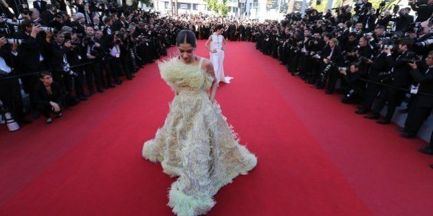 Indian actress Sonam Kapoor poses as she arrives for the screening of the film 'Inside Out' at the 68th Cannes Film Festival in Cannes, southeastern France, on May 18, 2015. AFP PHOTO / VALERY HACHE (Photo credit should read VALERY HACHE/AFP/Getty Images)