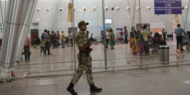 An Indian paramilitary soldier from the Central Industrial Security Force (CISF) keeps vigil at the Sardar Vallabhbhai Patel International airport in Ahmedabad on October 24, 2014, after major airports across India have been put on alert following the warning of an attack. Intelligence reports said suicide bombers could imminently attempt to board Air India flights from Mumbai and Ahmedabad airports. AFP PHOTO / Sam PANTHAKY (Photo credit should read SAM PANTHAKY/AFP/Getty Images)