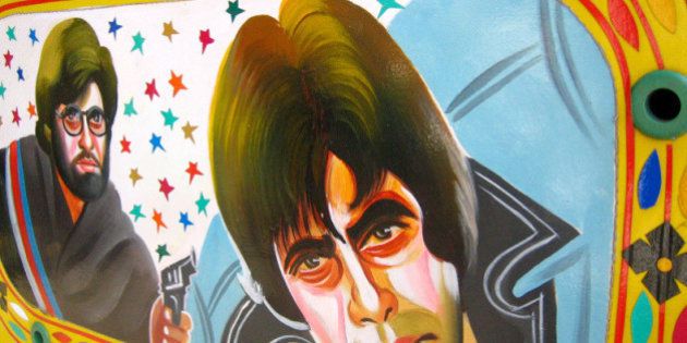 Instead of the usual Bollywood mudflaps this is a painting on the back window of a rickshaw. Its amazing how inventive local artists get at ways to decorate vehicles! Artwork by Bobby Solanki. Right: Amitabh Bachchan in Sholay.