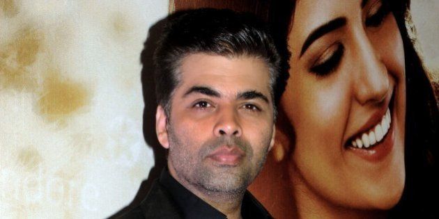 Indian Bollywood film producer and director Karan Johar attends the music launch of the upcoming Hindi film 'Lekar Hum Deewana Dil' written and directed by Arif Ali, in Mumbai on June 12, 2014. AFP PHOTO (Photo credit should read STR/AFP/Getty Images)